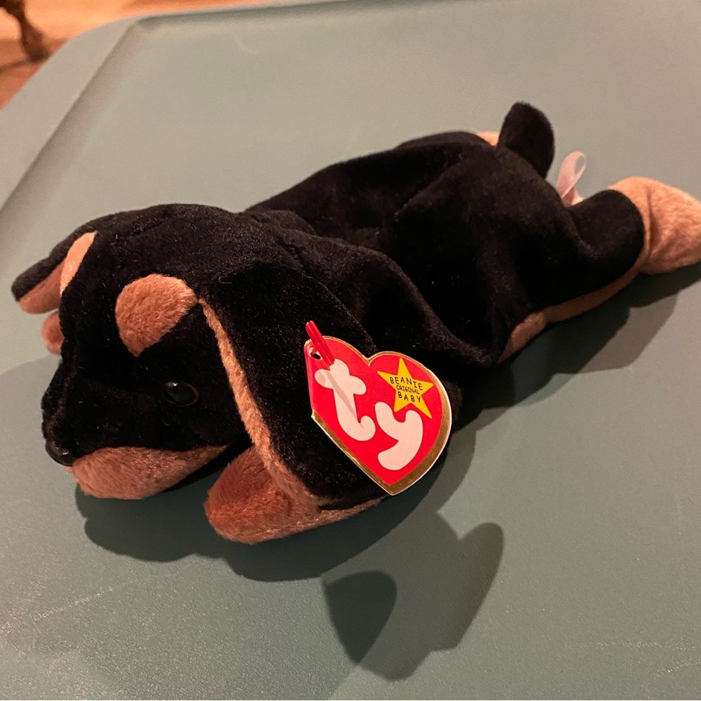 NWT BEANIE BABY - “Doby” Dog, kept in collectible case.